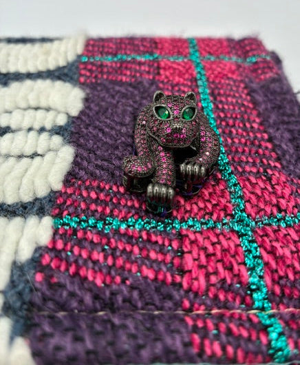Tweed box style handbag with gemstone wild cat brooch
